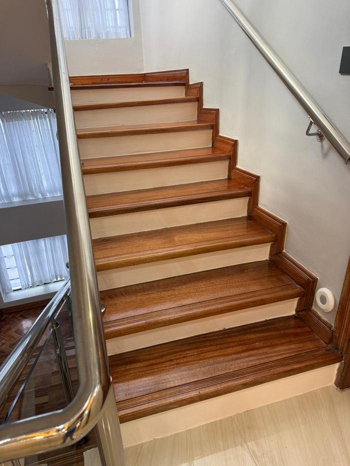 Mahogany staircase with steel handrail